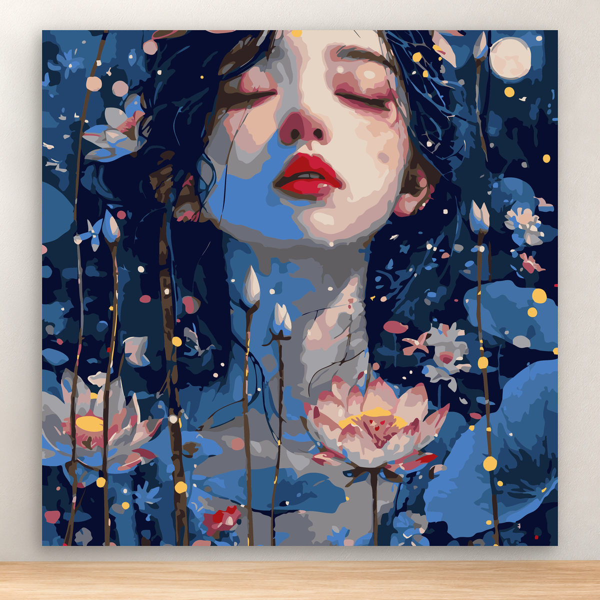 Dreamy woman's face with closed eyes among pink lotus flowers and blue botanicals, 20x20 cm