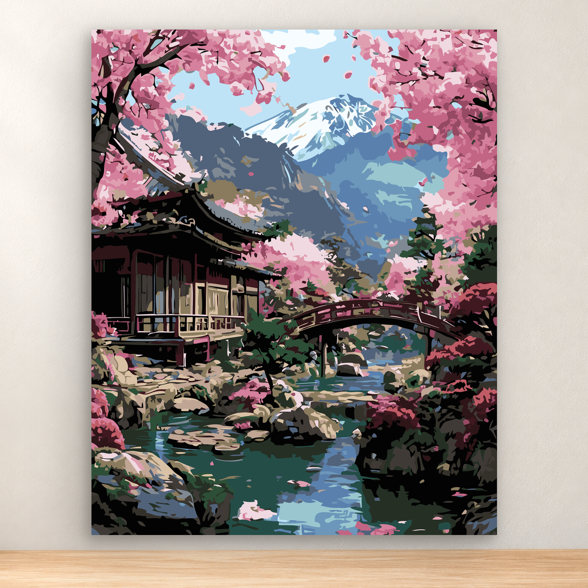 Japanese cherry blossom garden with mountain, bridge, stream, and wooden building, 40x50 cm